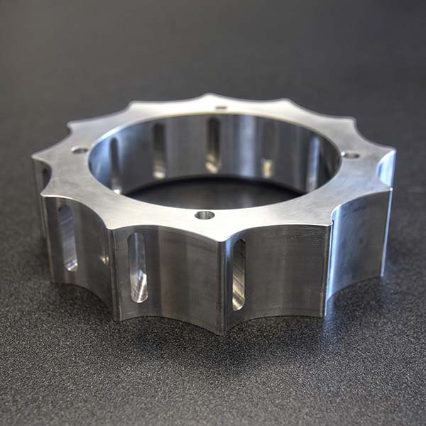 a custom machined gear laying on a table