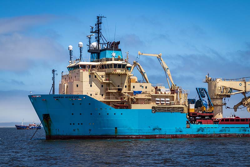 a large ship out on the water