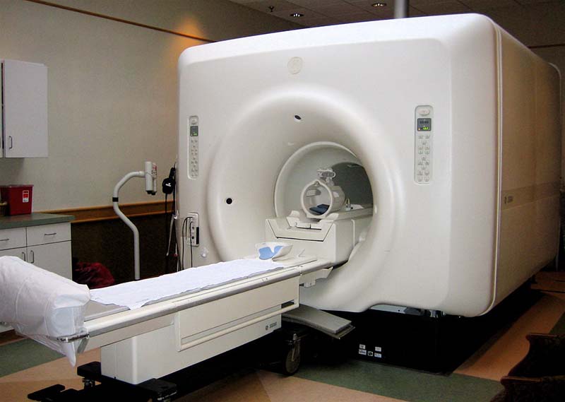 an MRI machine in an exam room